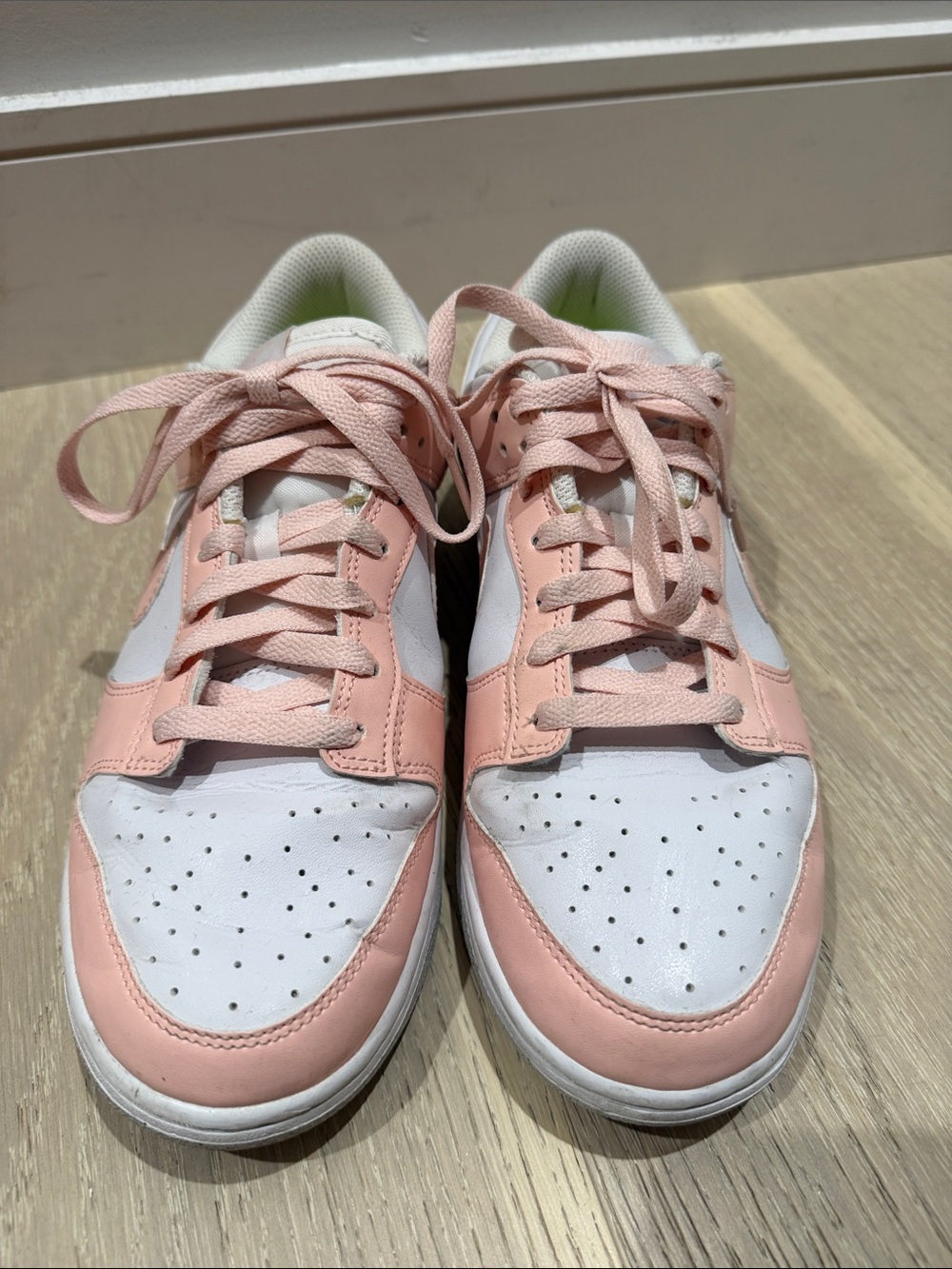 Nike Women's Low-Top Lace-Up Sneakers in Light Pink and White
